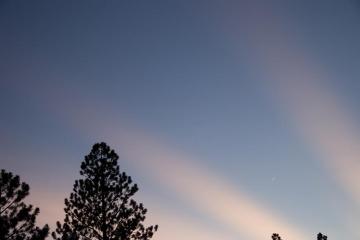 Moon and Venus in crepuscular rays
